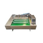 Роликовая вакуумно-упаковочная машина.